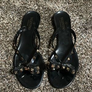 Black Valentino flip flops